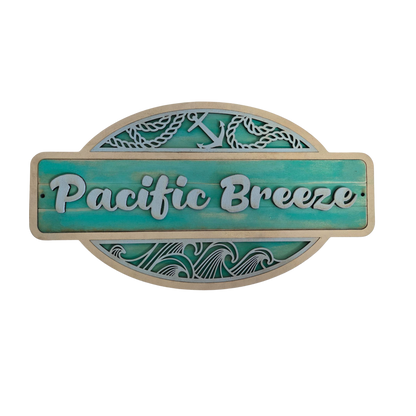 Decorative sign with 'Pacific Breeze' text on a teal background
